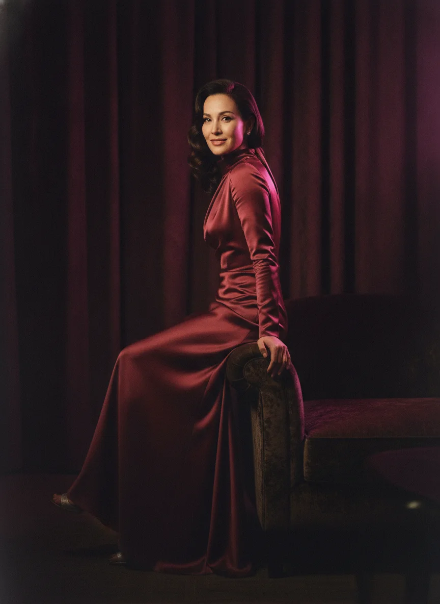 An elegant AI companion render in a dark lounge